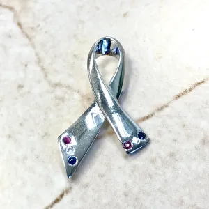 14 Karat White Gold Ruby, Sapphire & Diamond Ribbon Brooch