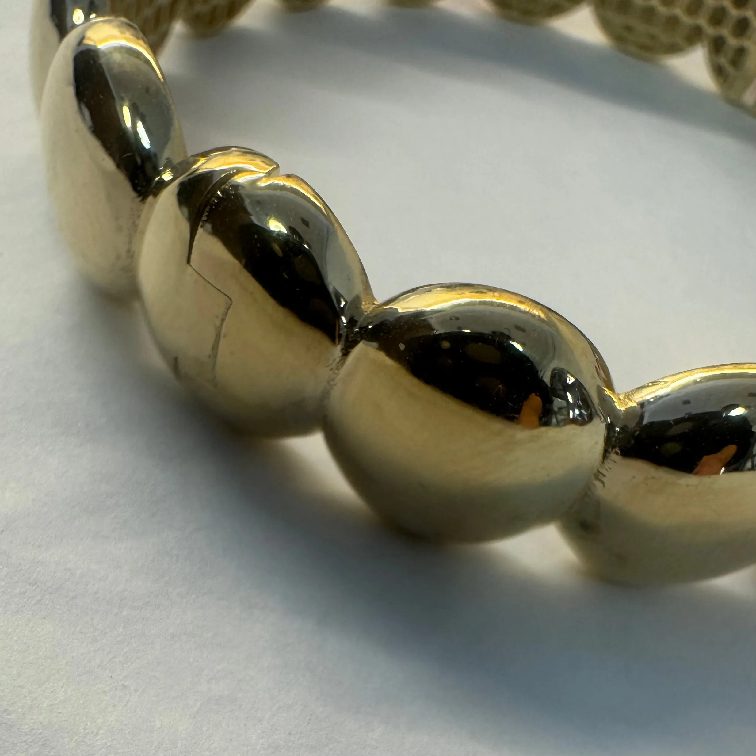 14K gold bracelet set with bold, rounded links