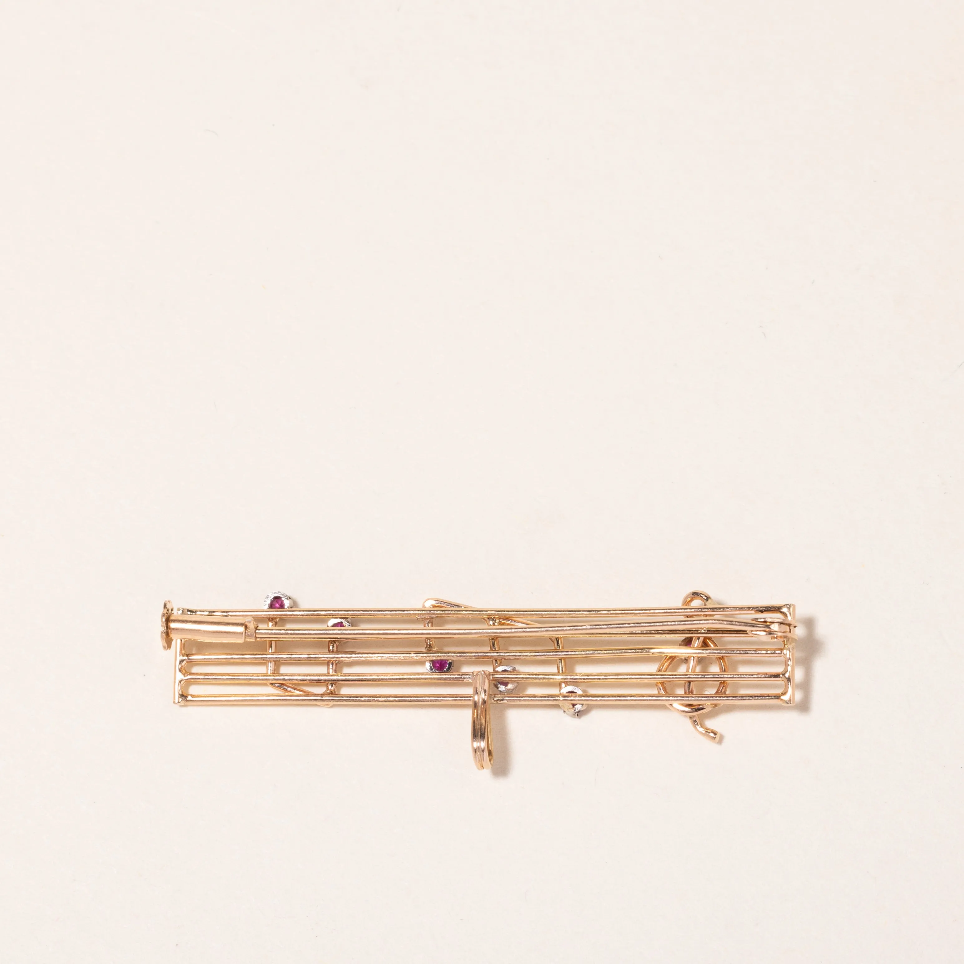 18K Yellow Gold Pink Topaz Music Notes Brooch | 0.14ctw |