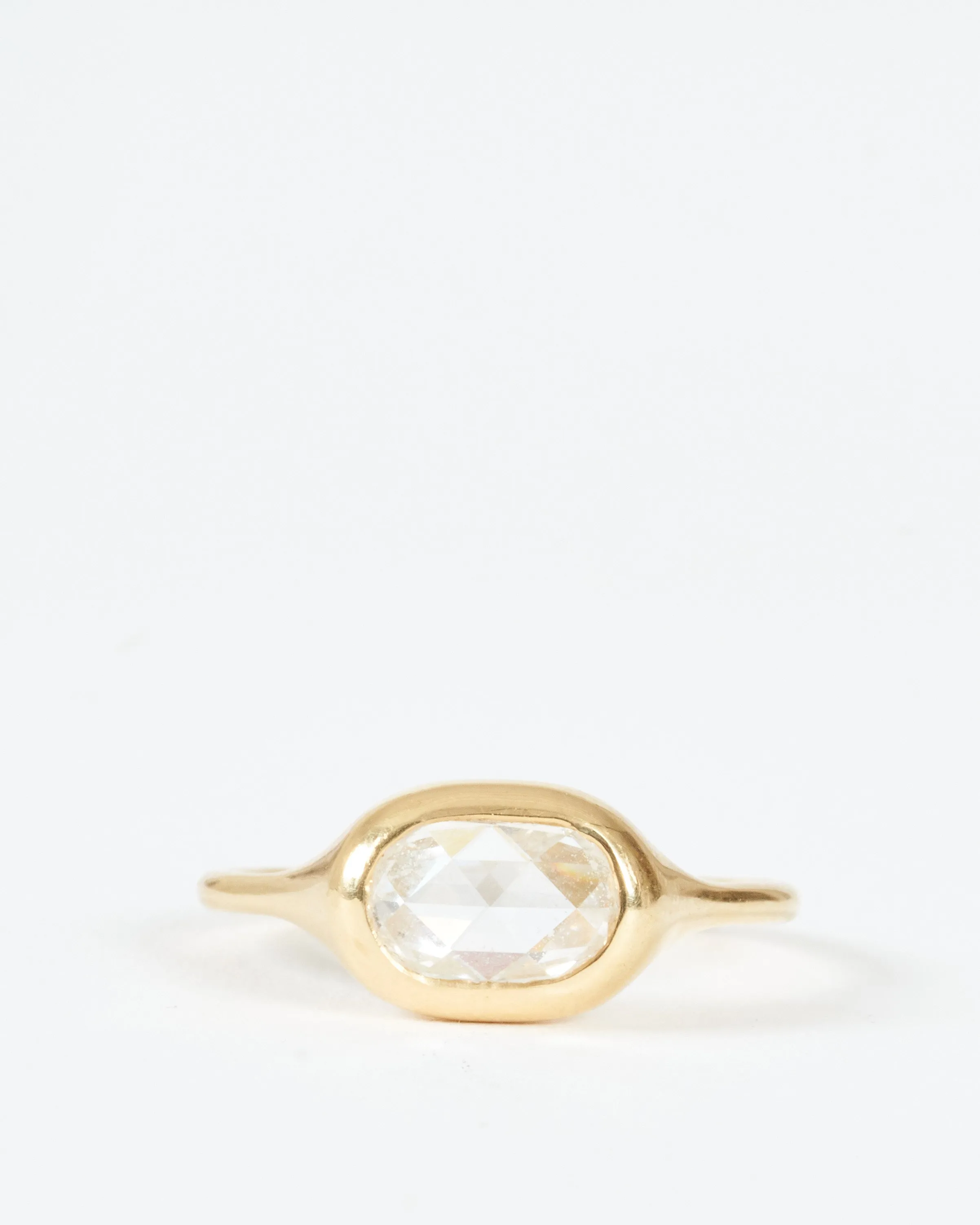 carved ring east/west oval