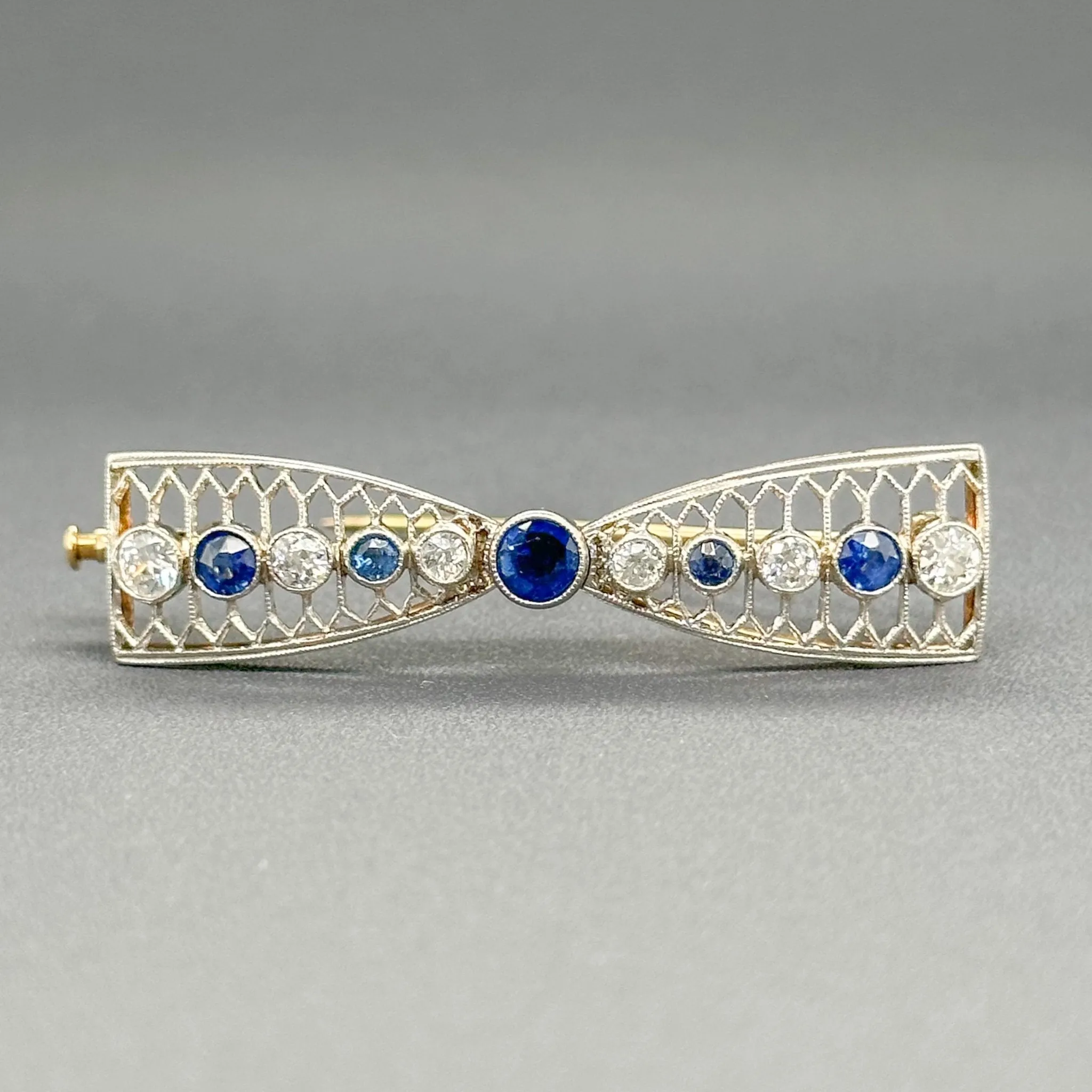Estate 14K Y Gold 0.84cttw Sapphire & 0.55cttw G-H/SI1-2 Diamond Bow Pin