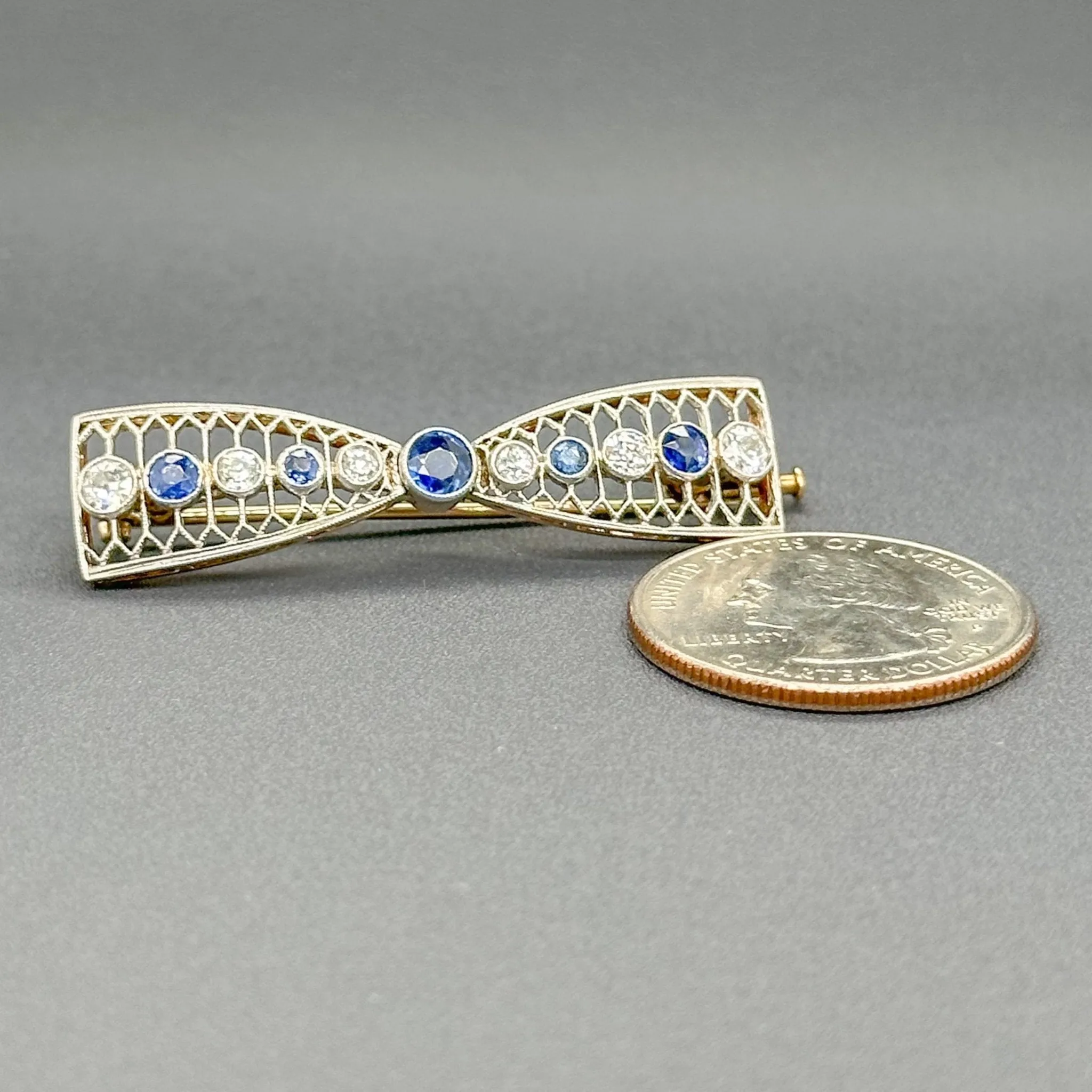 Estate 14K Y Gold 0.84cttw Sapphire & 0.55cttw G-H/SI1-2 Diamond Bow Pin