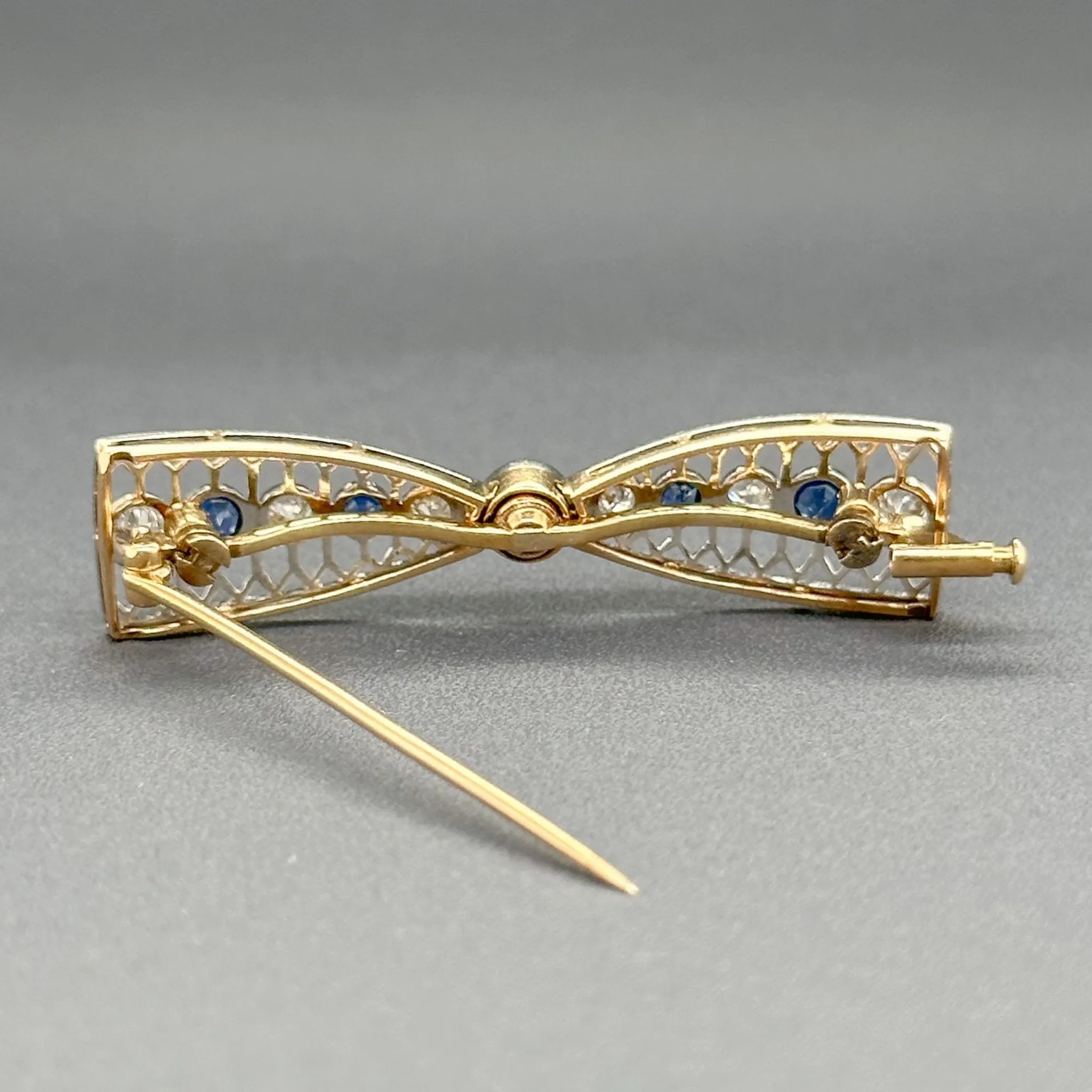 Estate 14K Y Gold 0.84cttw Sapphire & 0.55cttw G-H/SI1-2 Diamond Bow Pin