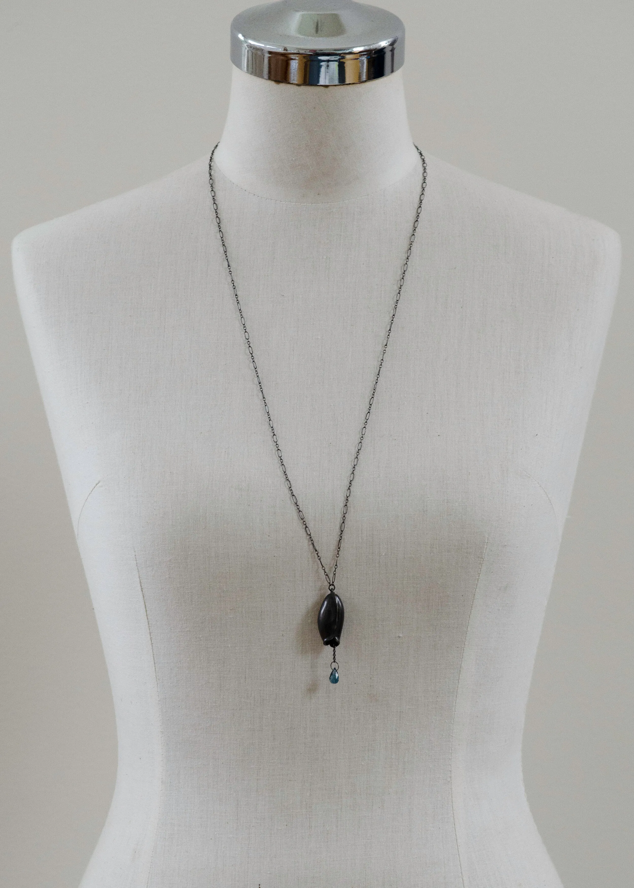 Long pod and Blue topaz necklace