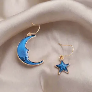Mismatched Blue Crescent Moon and Star dangle earrings