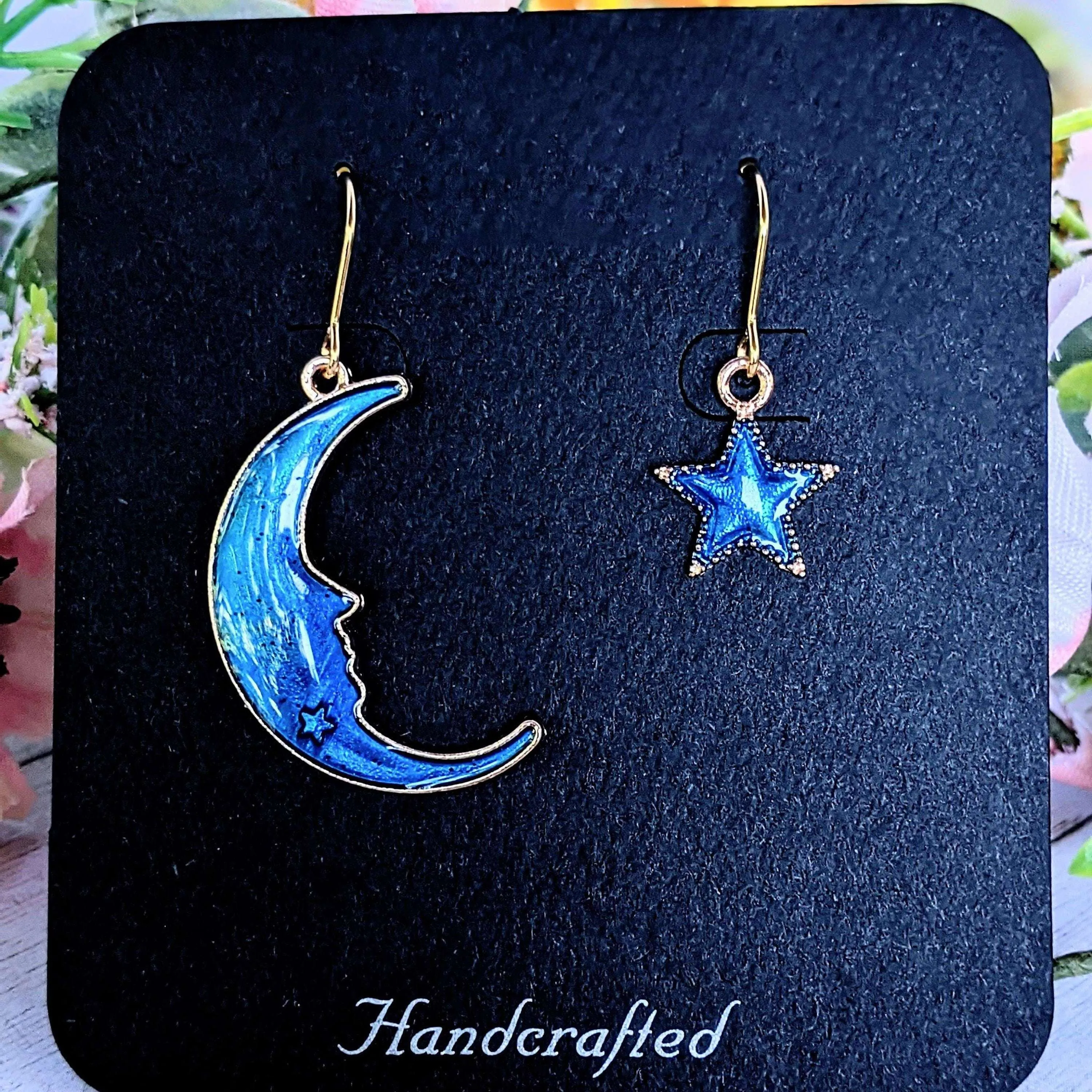 Mismatched Blue Crescent Moon and Star dangle earrings