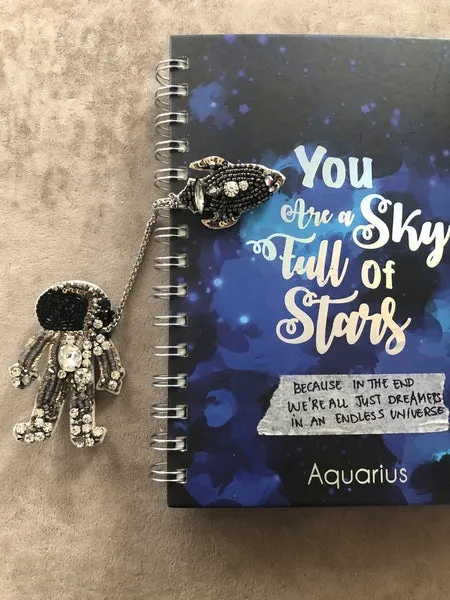 the astronaut brooch