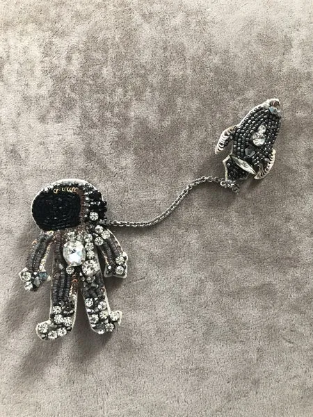 the astronaut brooch