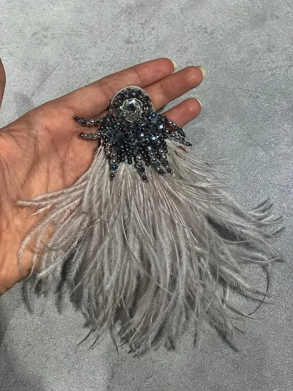 the flip-side feather brooch