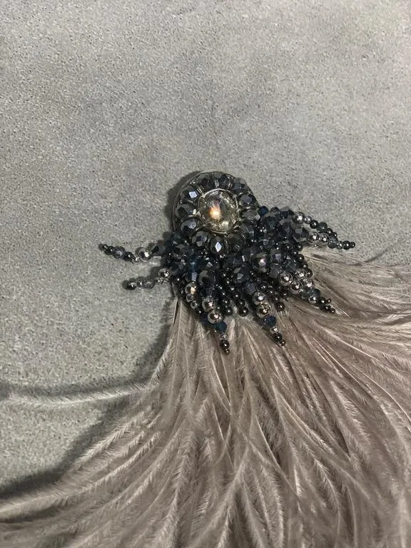 the flip-side feather brooch