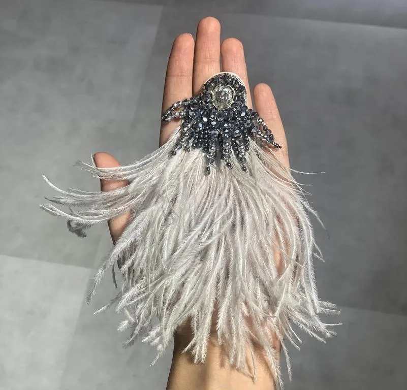 the flip-side feather brooch