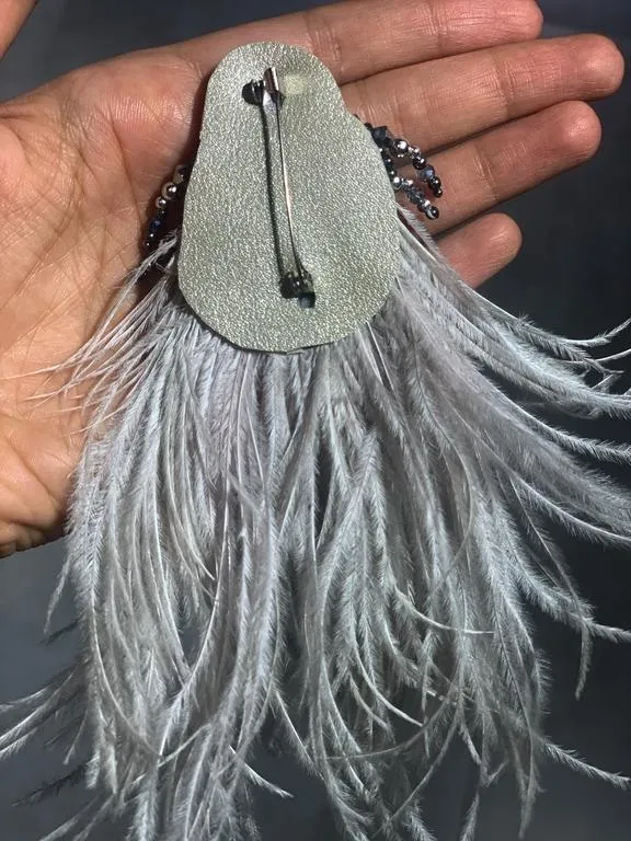 the flip-side feather brooch