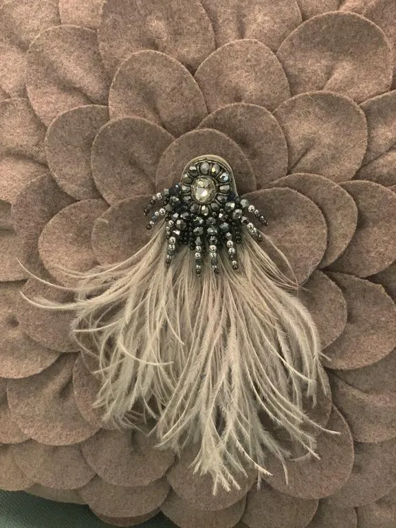 the flip-side feather brooch