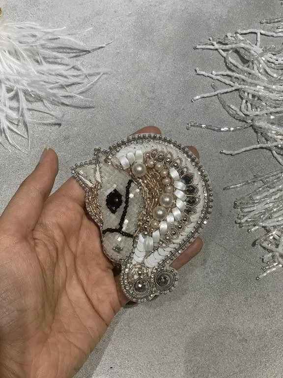 the magical horse brooch