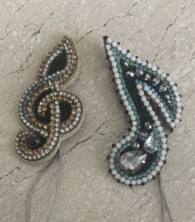 the music notes brooch