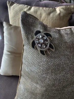 the telling tortoise brooch