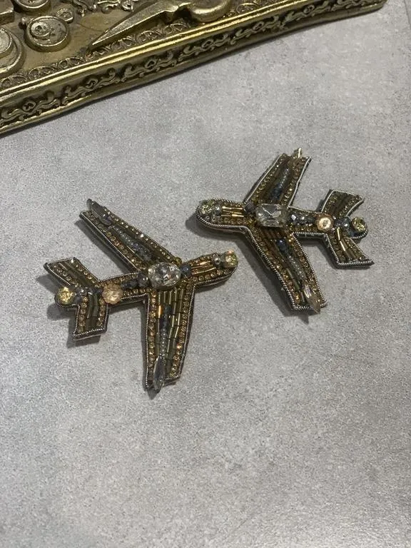 the travelling plane brooch