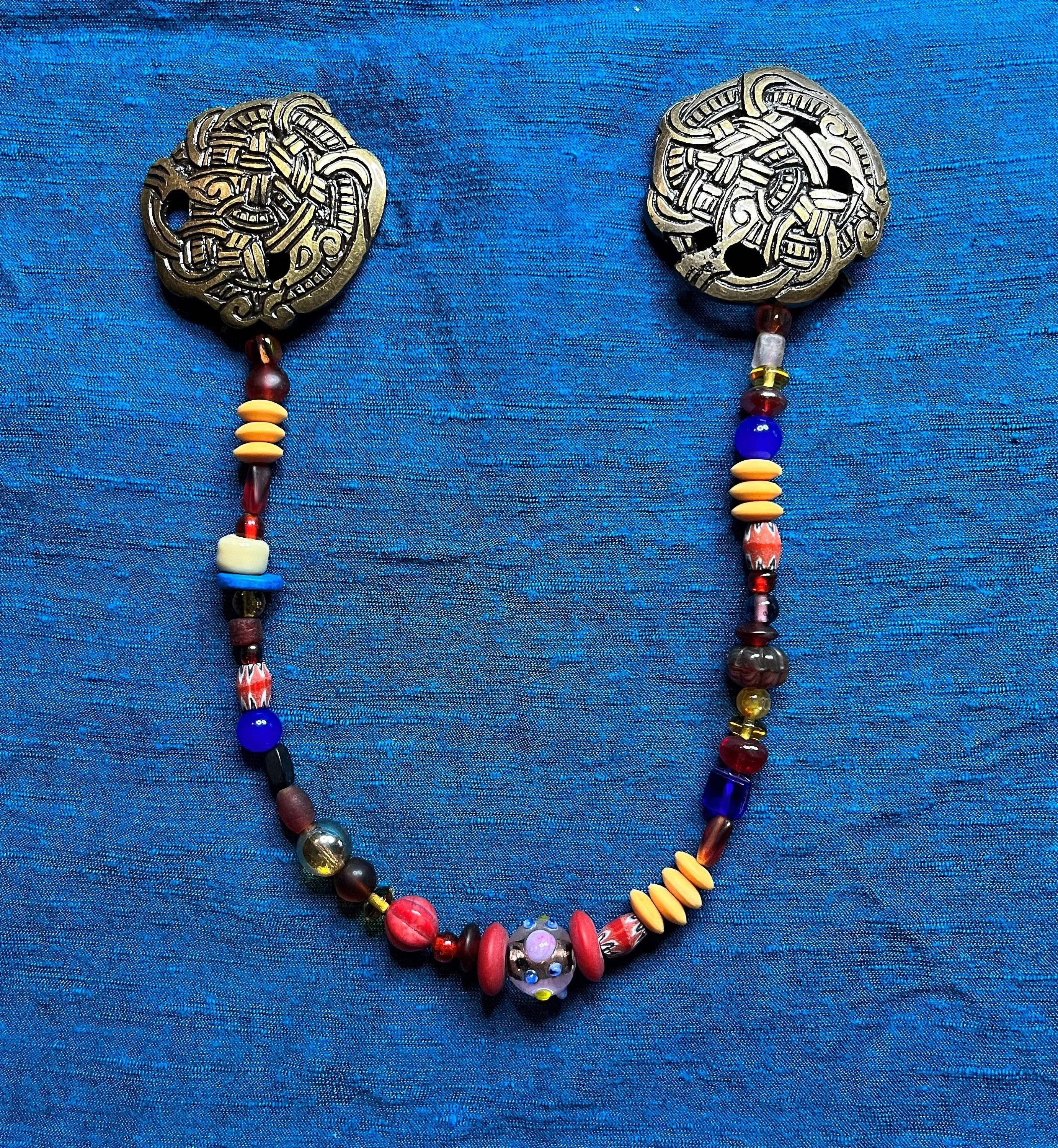 Viking Round Brooches and Glass Bead String