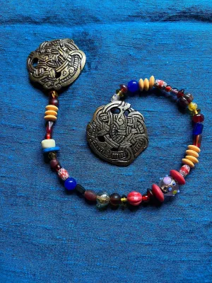 Viking Round Brooches and Glass Bead String
